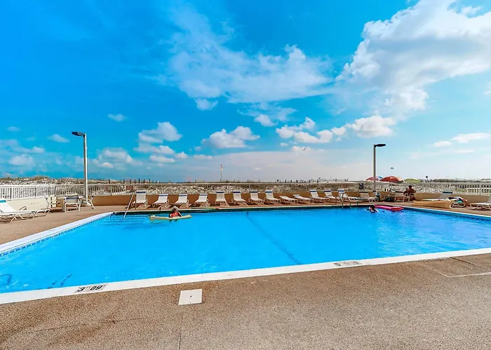 Beachfront With Shared Outdoor Pool Ac Private Balcony Views Wifi Holiday home *